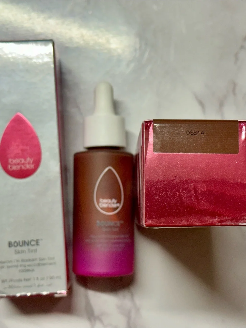 beautyblender Bounce Skin Tint Bottle in Pink and Brown